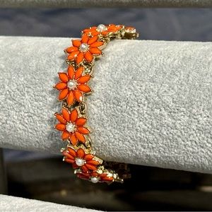Orange rhinestone flower bracelet